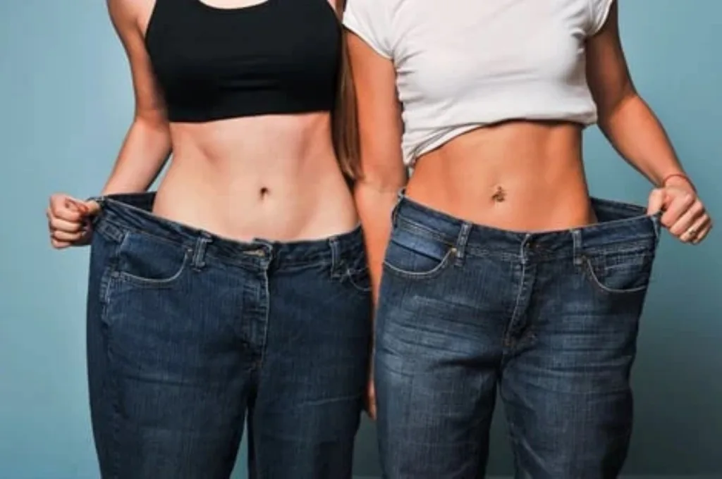 Visible waistline reduction and improved body contour after a weight loss program that may include lipotropic injections for metabolic support.
