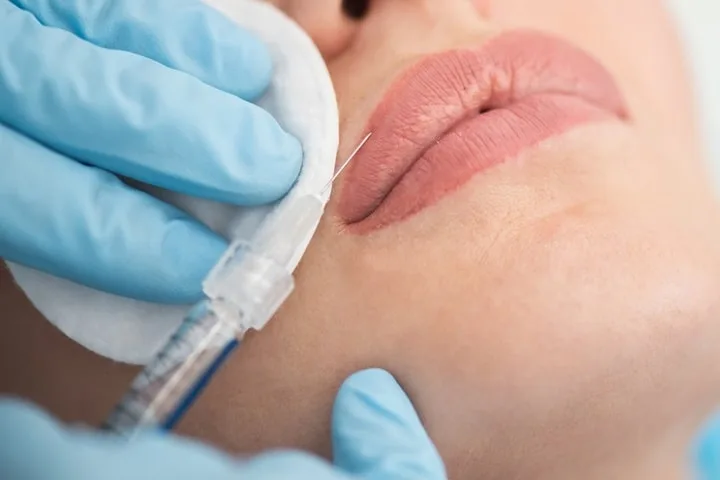 illustrating the quality and care involved in treatments that influence lip filler cost and overall results for patients seeking natural enhancement.